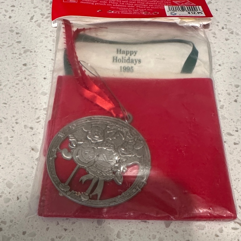 Disney Silver Ornament with Red Ribbon